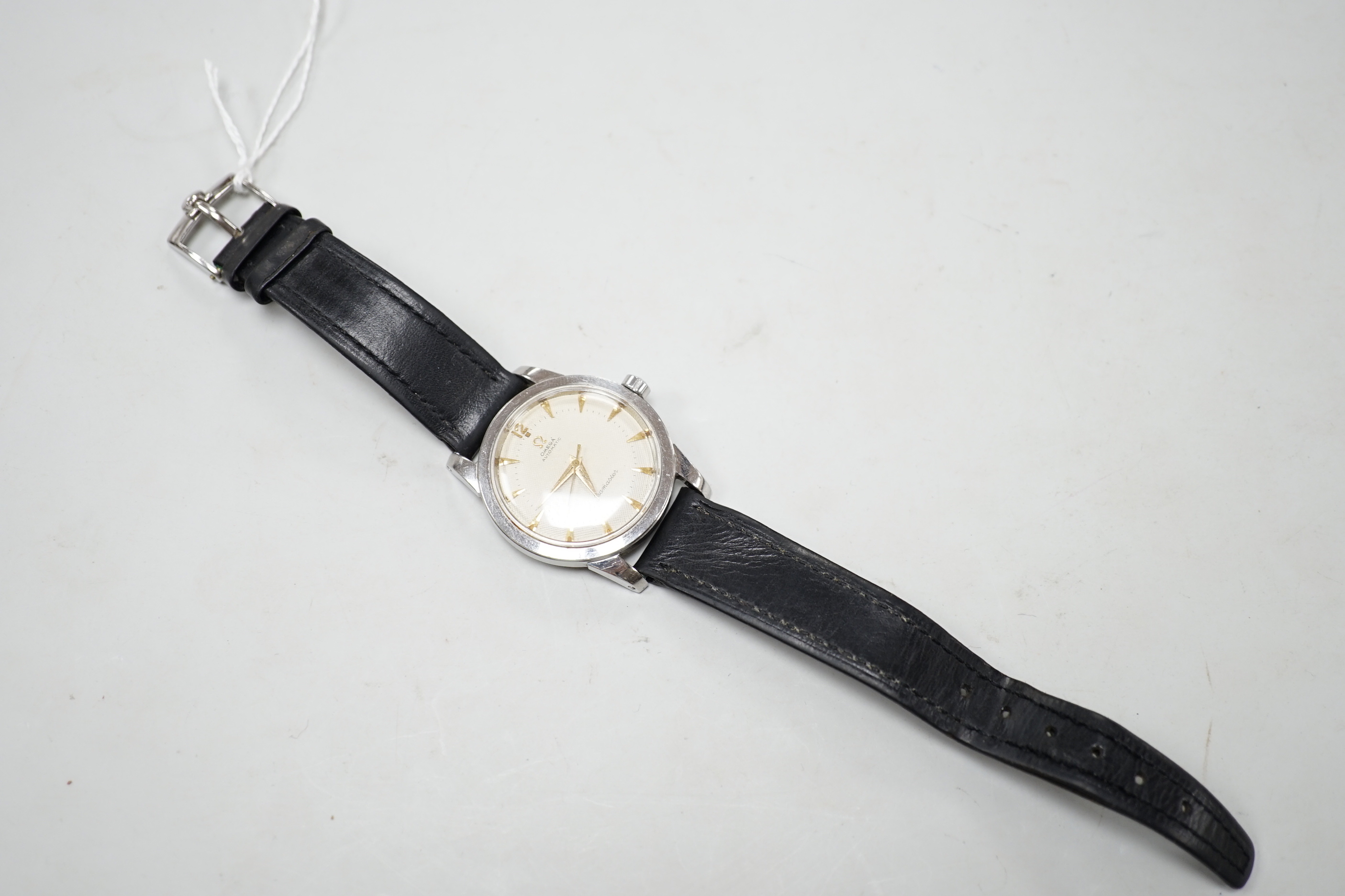 A gentleman's early 1950's stainless steel Omega Seamaster automatic wrist watch, movement c.351, on a leather strap with Omega buckle, no box or papers.